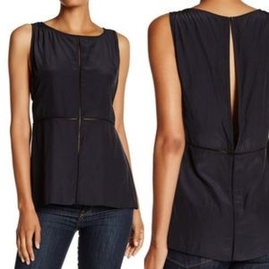 Calvin Rucker sleeveless keyhole switch blouse